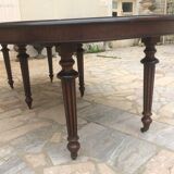 Oval table with extensions in massive mahogany napoleon III era.