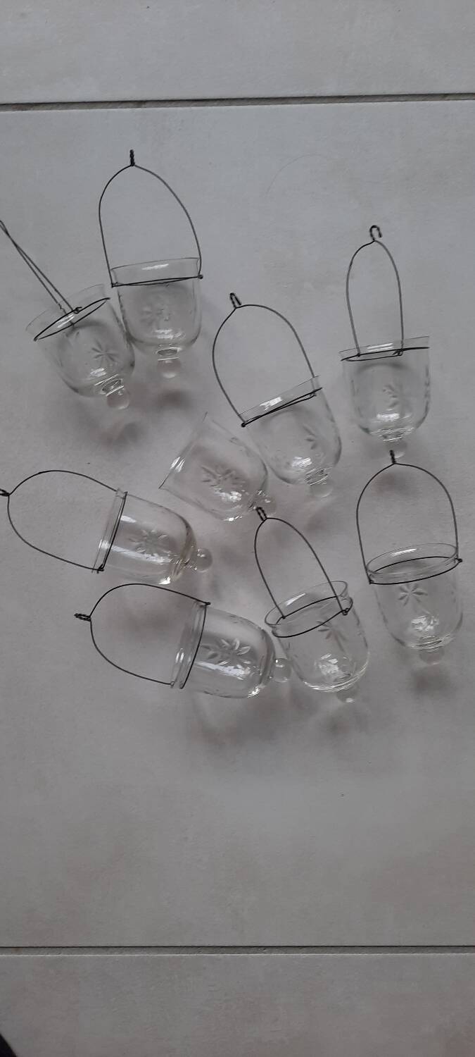 Set of hanging glass and metal tealight holders