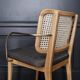 Light wood caning chair armrests red Edition caviar fabric