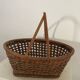 Vintage wicker and cane basket in bohemian style