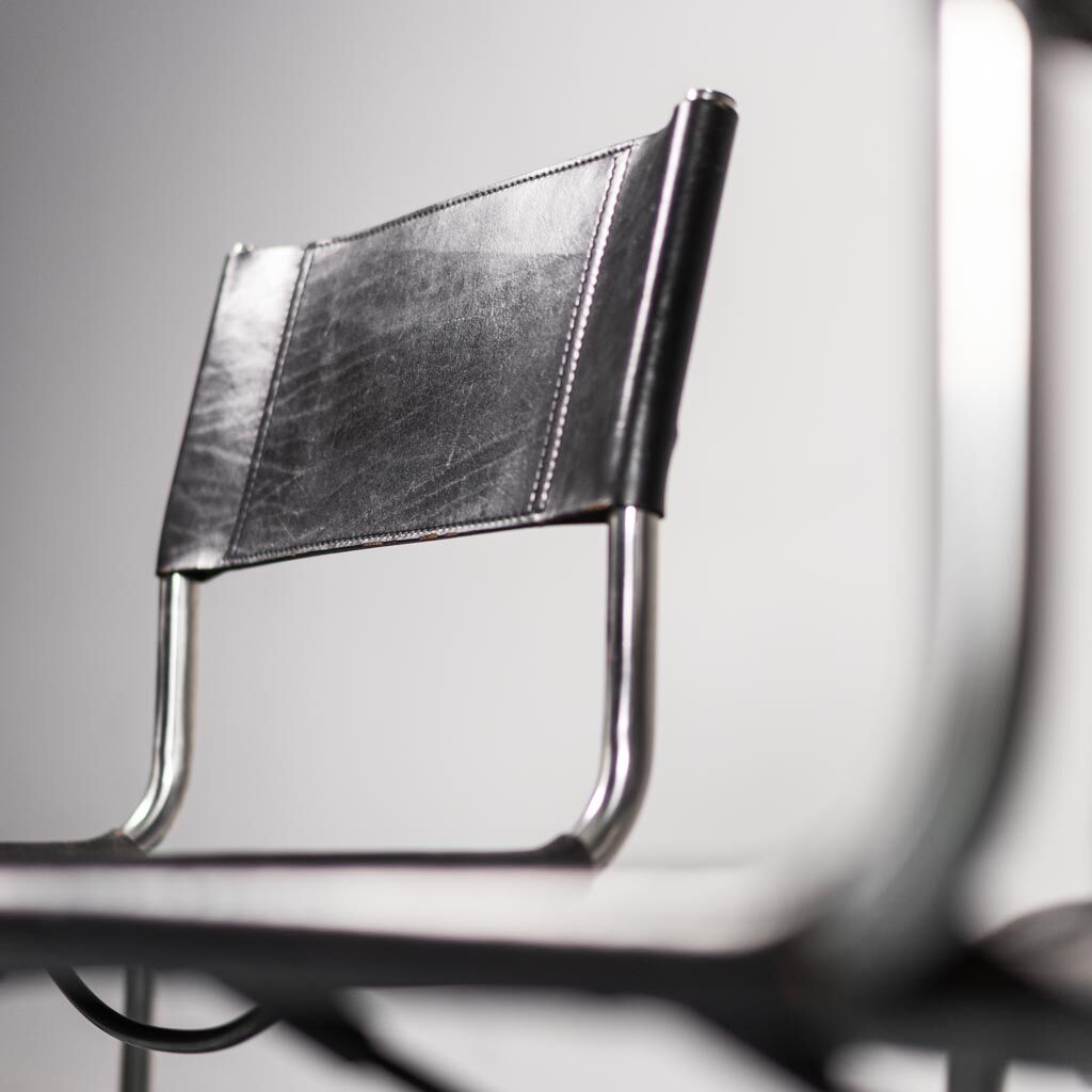 Set of 4 chairs in black leather 70s vintage