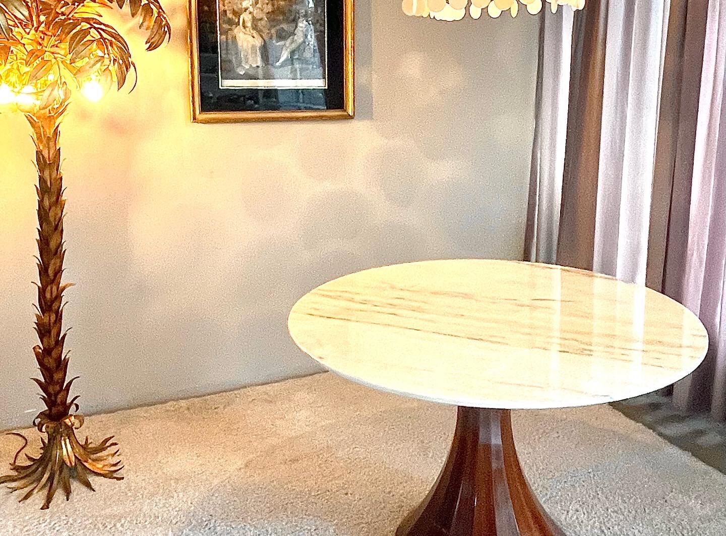 Marble and rosewood round dining table