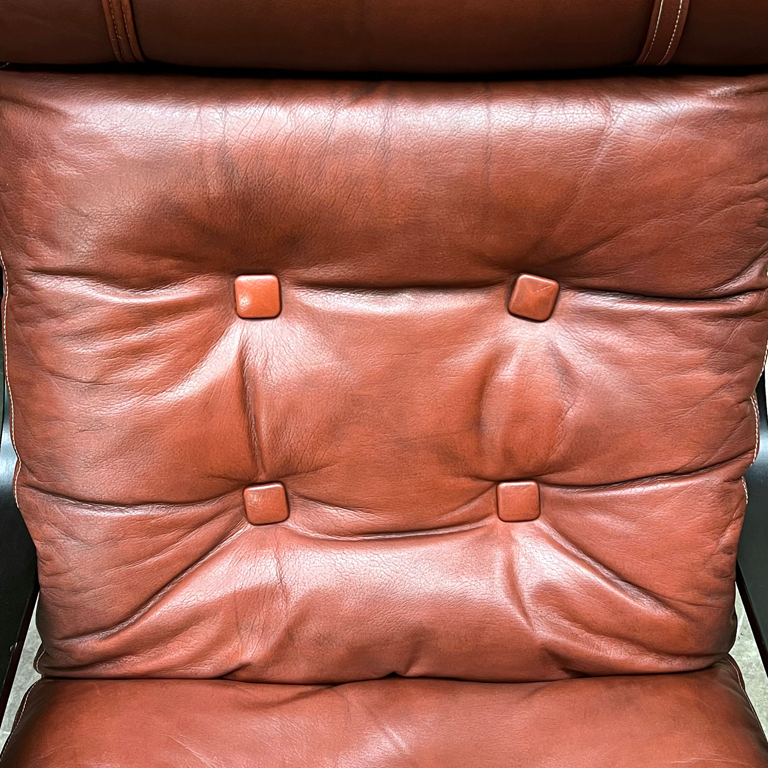 Pair of leather lounge chairs