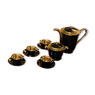 Black and gold tea set