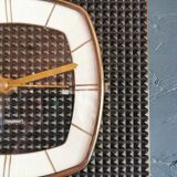 Vintage formica clock rectangular silent wall pendulum "Trophy black reliefs"