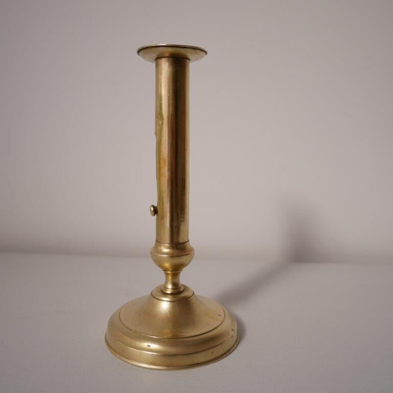 Brass candle holder with pusher