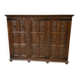 Antique neo-Gothic wardrobe with linen drawers.