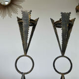 Pair of "brutalist" candlesticks in forged and hammered raw steel 70s