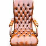 Pair of leather Chesterfields and footstools