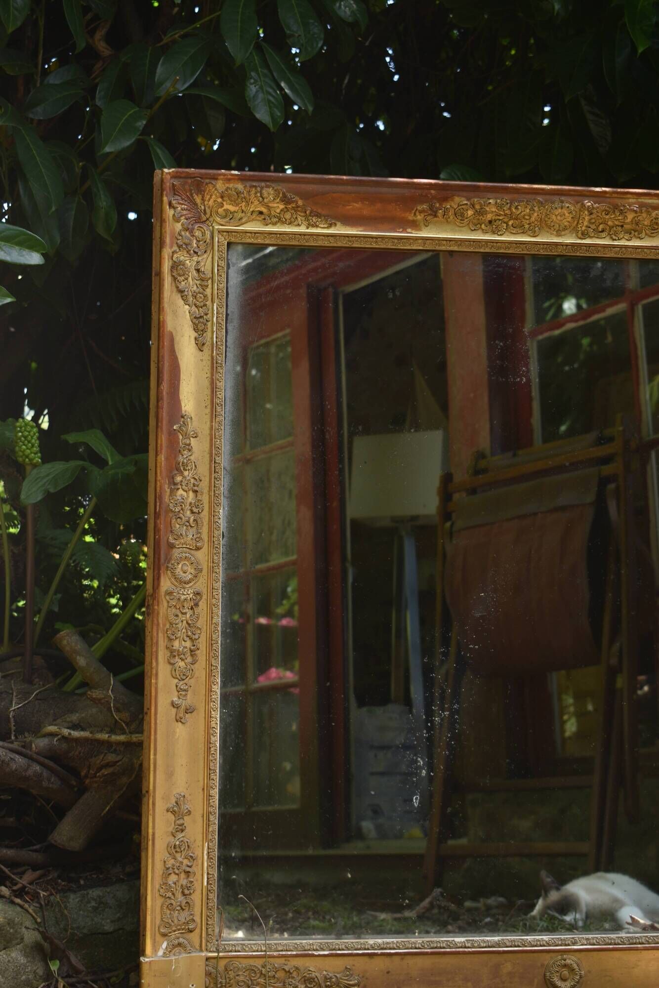 Large gilded Empire mirror from the 19th century.