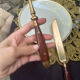 Wood and brass serving utensils