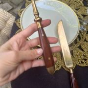 Wood and brass serving utensils