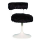 Space age design armchair from the sixties, fluffy stool with trumpet base.