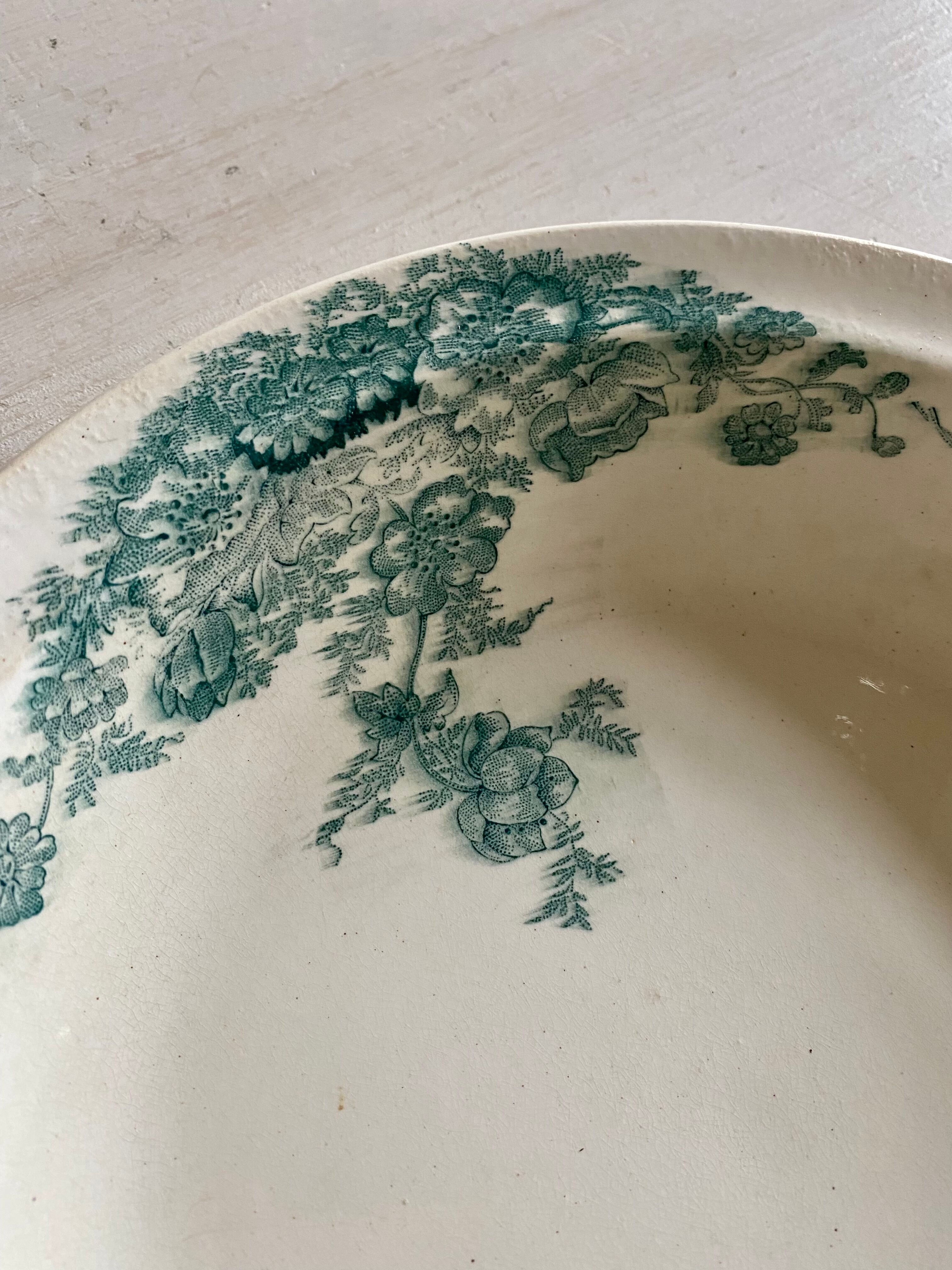 Round dish signed Bertrand Bordeaux model Anémone