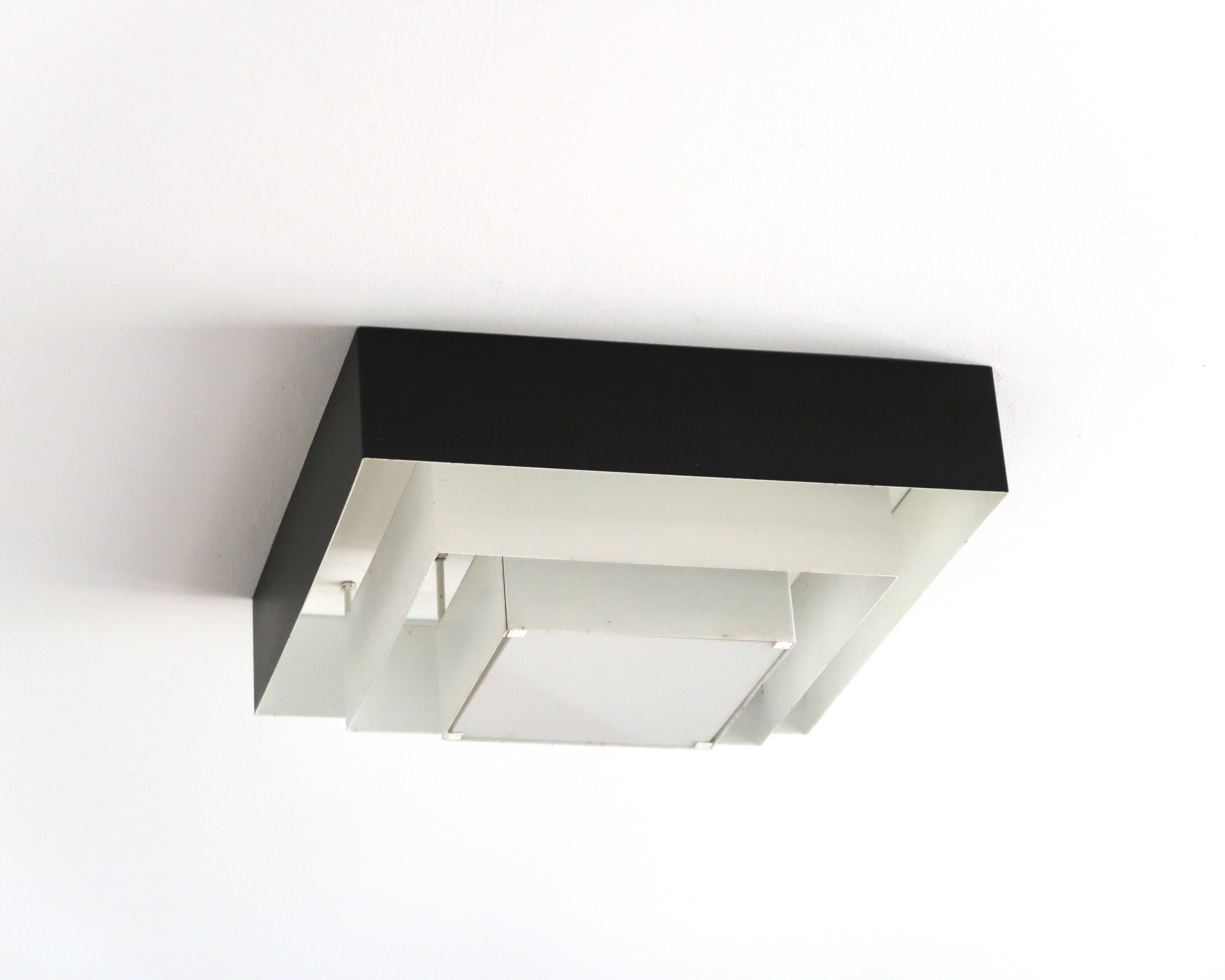 Ziggurat ceiling light Raak Amsterdam in black and white metal, 1960s.