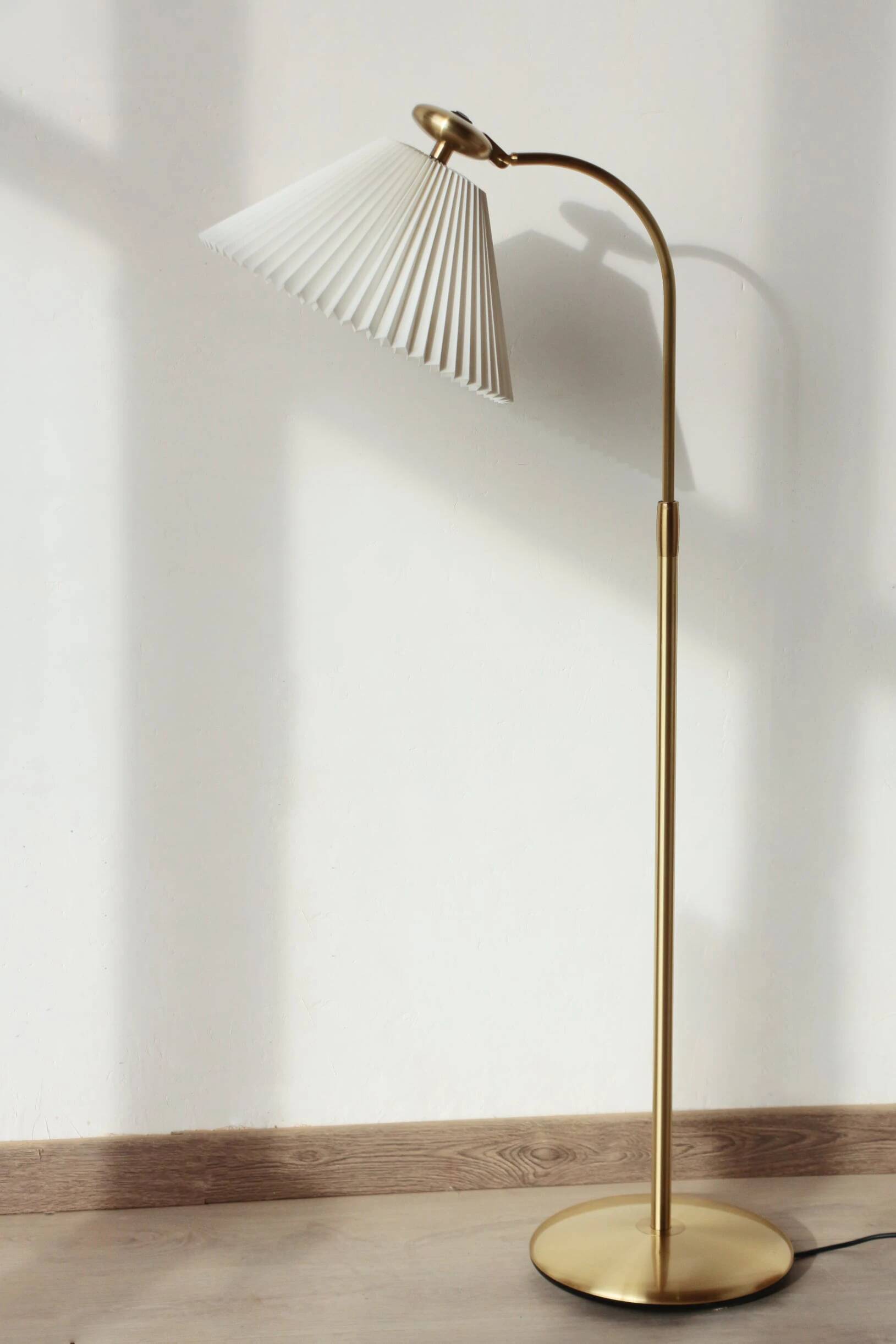 Le Klint 340 floor lamp in brass – design by Philip Bro Ludvigsen