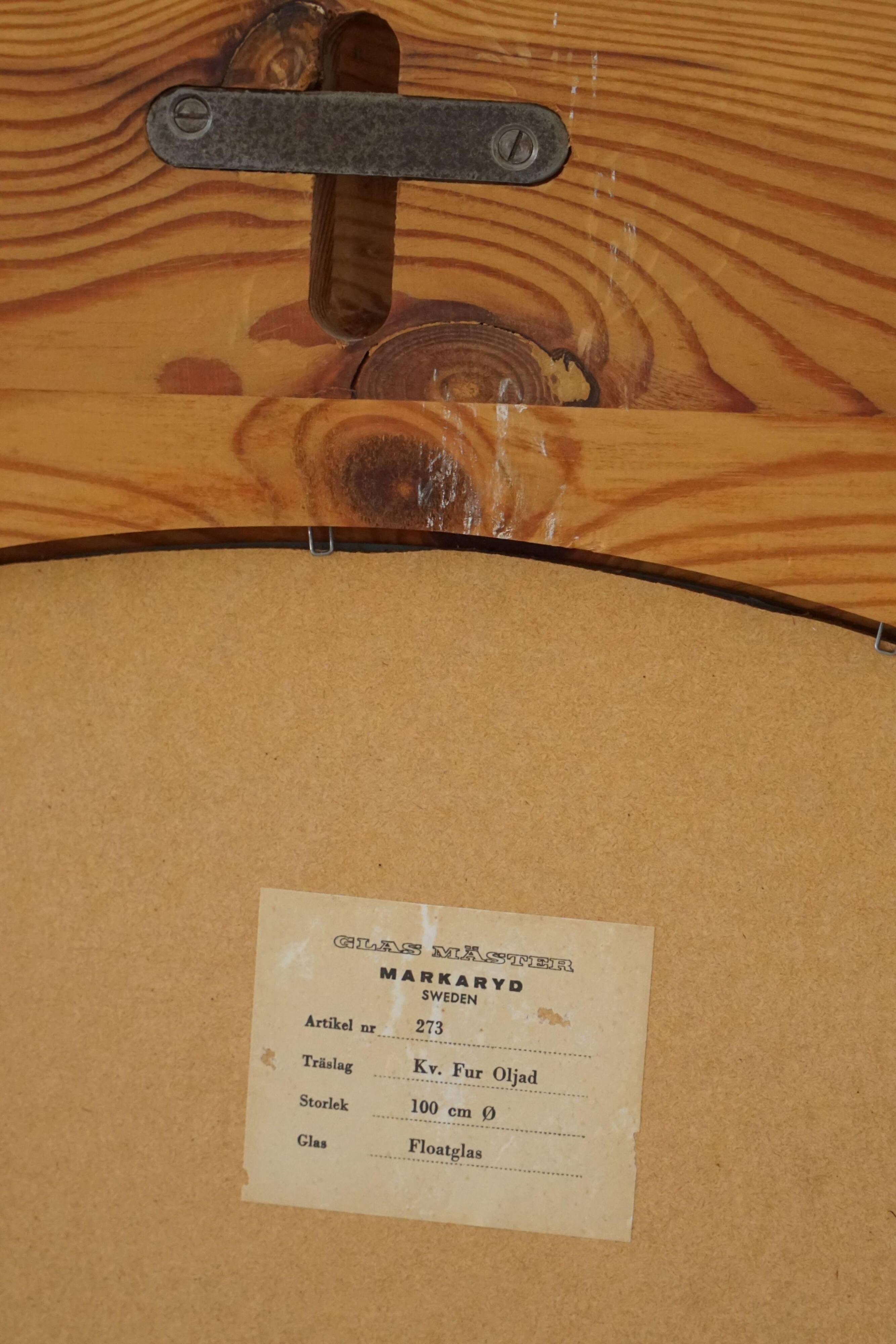 Large round wall mirror in solid pine by Glasmäster Markaryd, Sweden, 1960s.