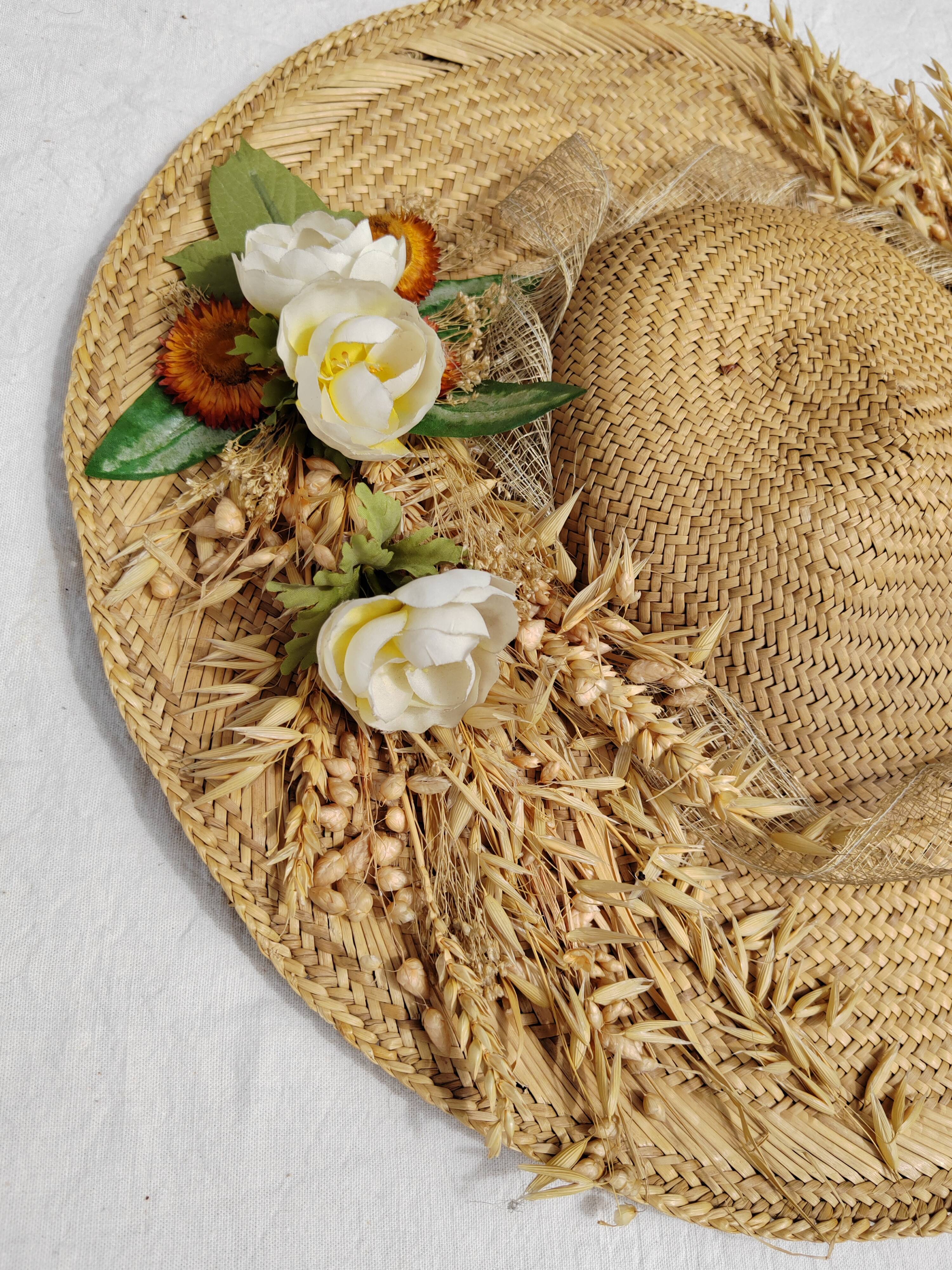 Decorative straw hat with dried flowers