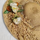 Decorative straw hat with dried flowers