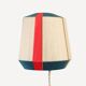 The Epicurienne coral peacock wall light