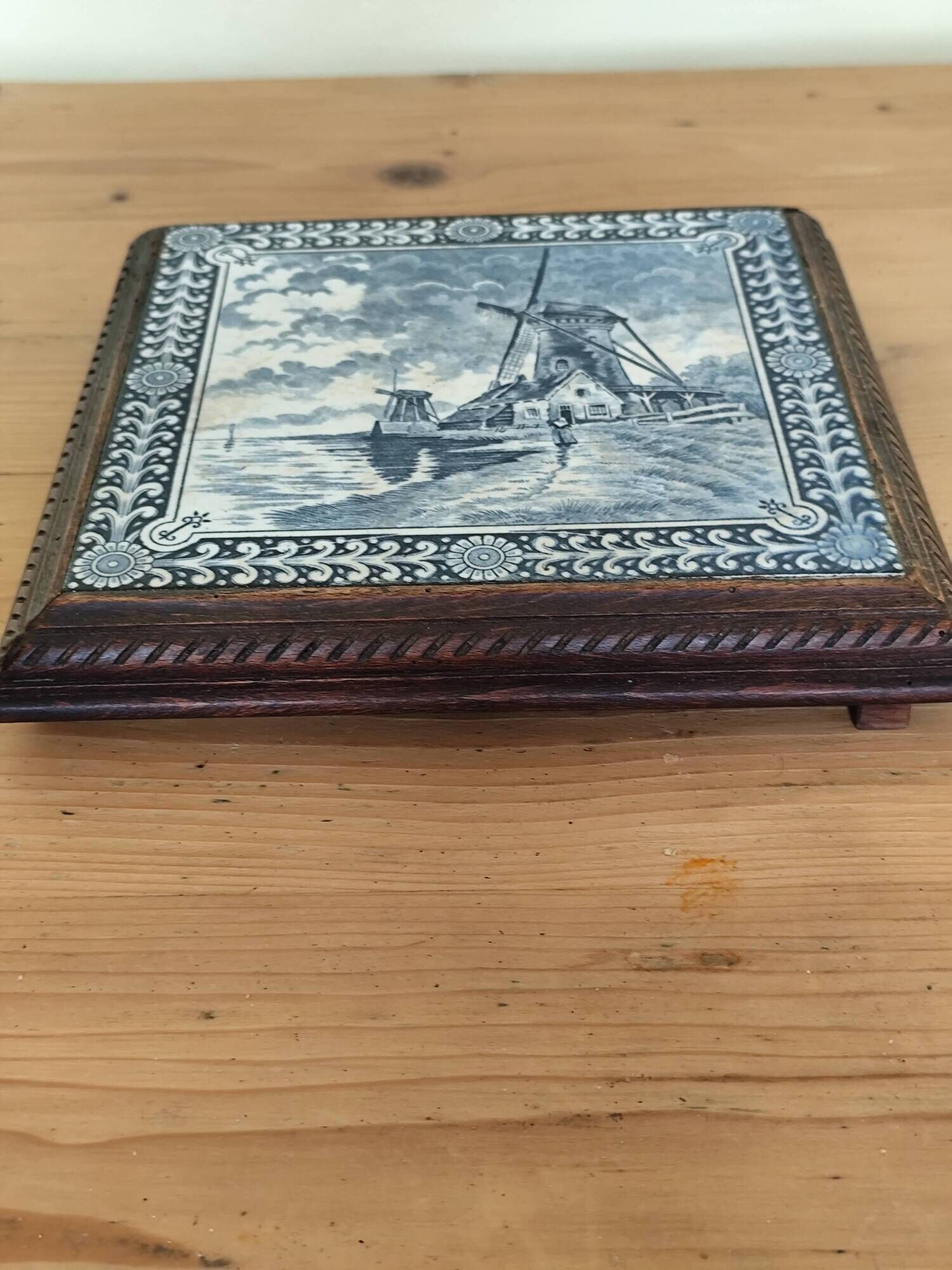 Ceramic tile trivet and wooden frame with Dutch windmill.
