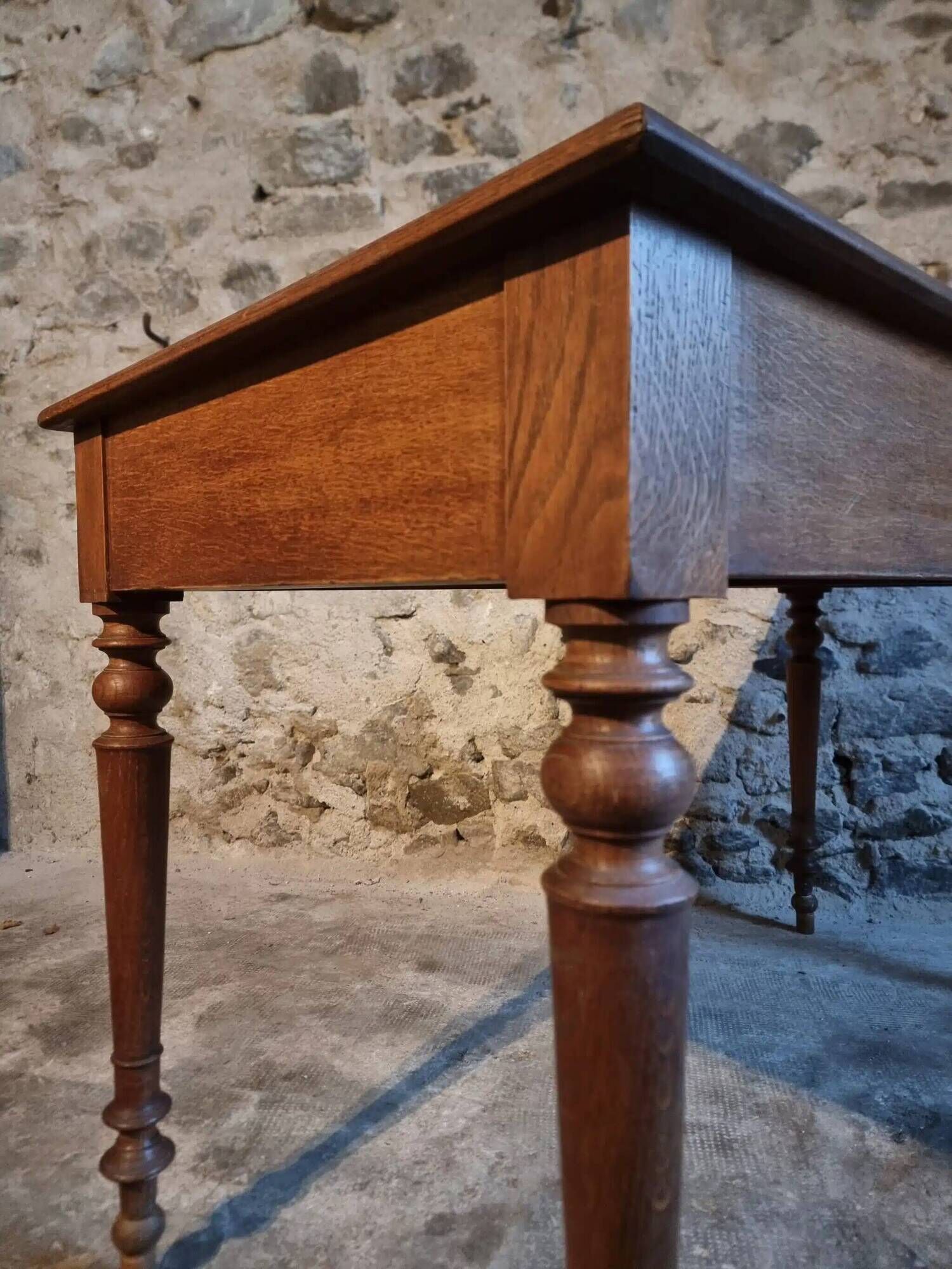 Antique French writing desk in oak with two drawers, 1920s.