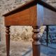 Antique French writing desk in oak with two drawers, 1920s.