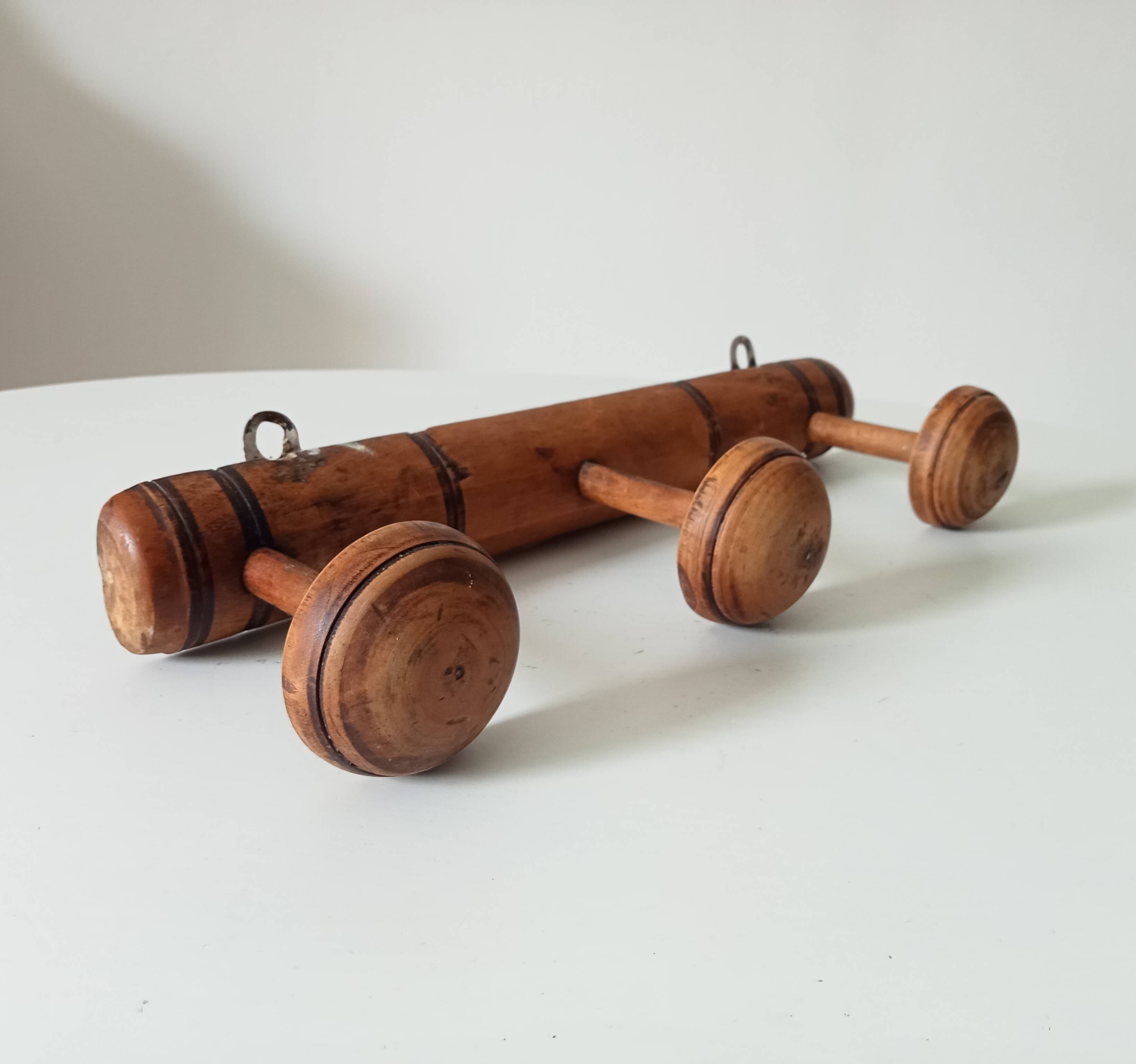 Antique folk art wall coat rack from the 50s