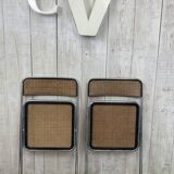 Pair of chrome and cane folding chairs