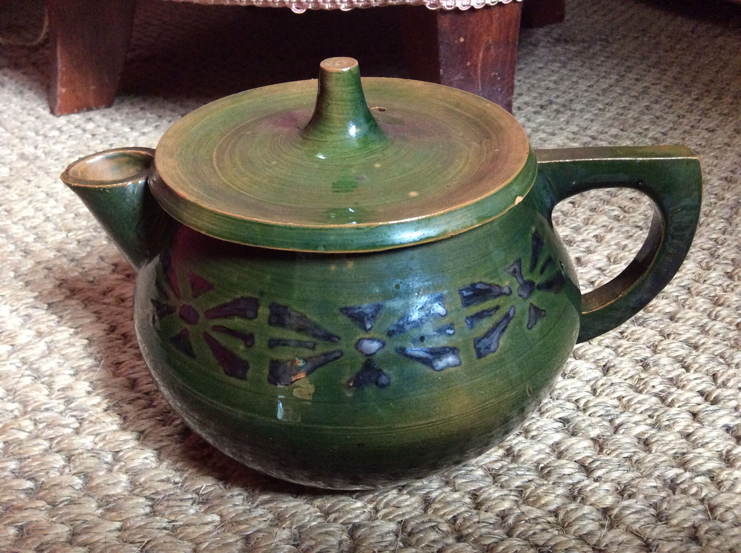 Glazed terracotta teapot