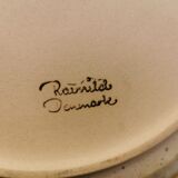 Ceramic plates, designed and made by Danish Ravnild (both stamped and signed)