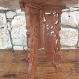 Old small carved wooden table