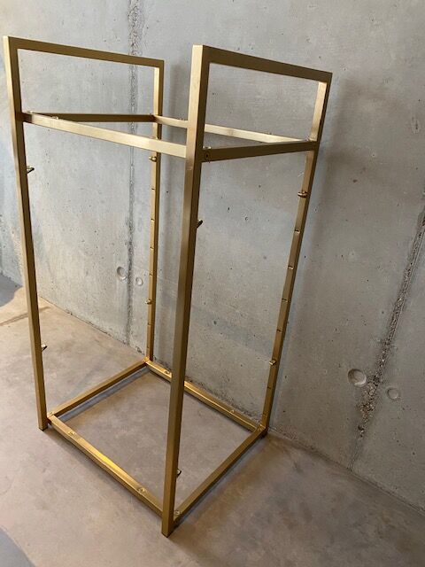 Golden brass and glass shelves