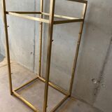 Golden brass and glass shelves