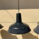 Three industrial suspensions in black and white enamelled sheet metal large format