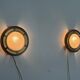 Pair of round glass wall lights, brass base and Wood Wood, 1960s, Italy.