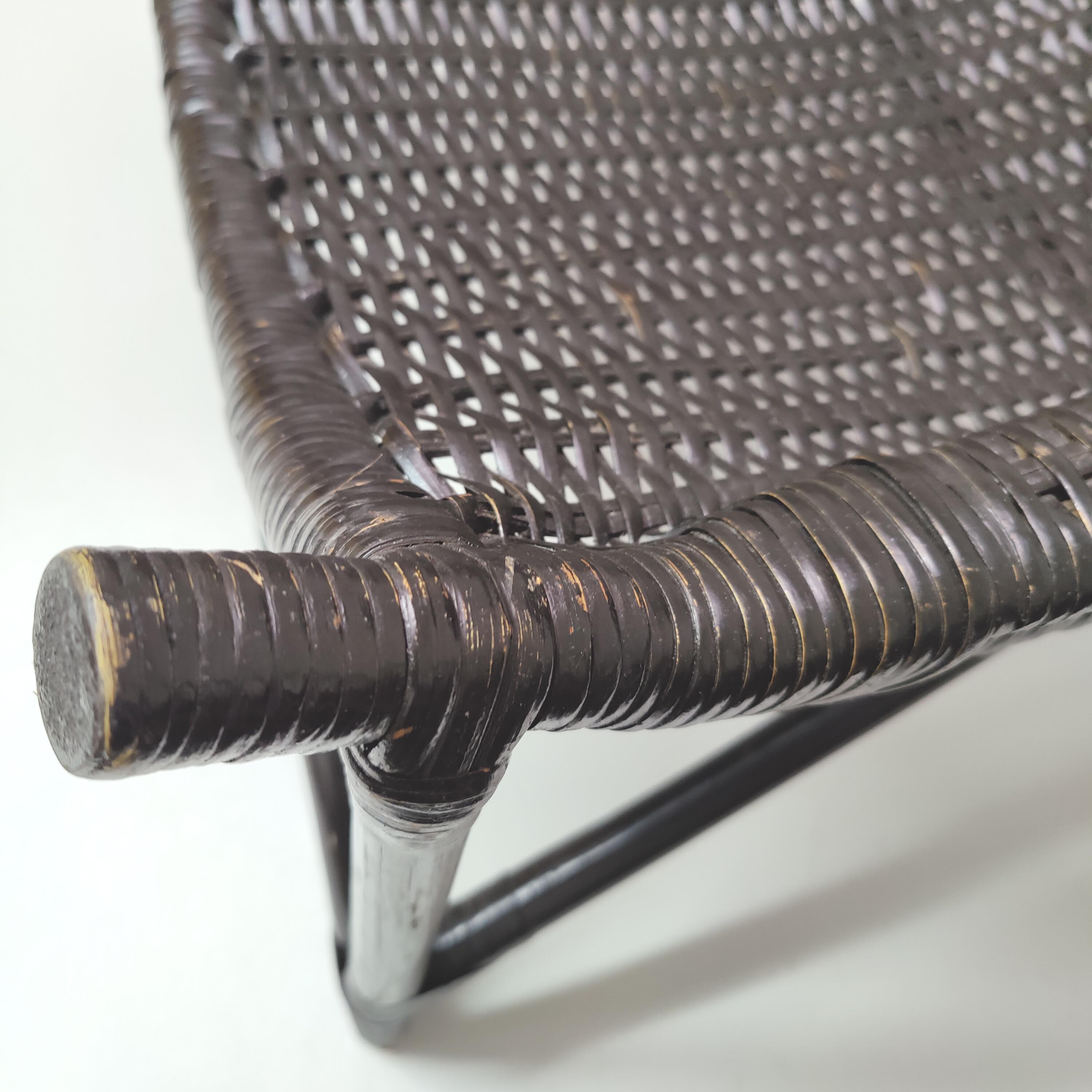 Vintage black rattan deck chair