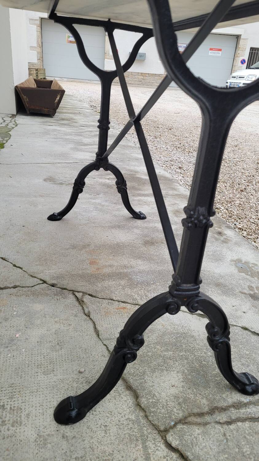 Marble and cast iron restaurant bistro table