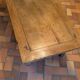 Solid oak coffee table in the style of a maie.