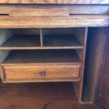 American desk with sliding shutter in solid oak, 20th century