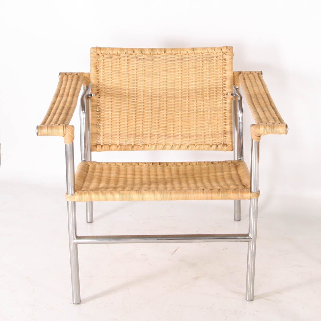 Pair of wicker and chrome armchairs