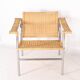 Pair of wicker and chrome armchairs