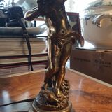 Brass cherub-laying lamp