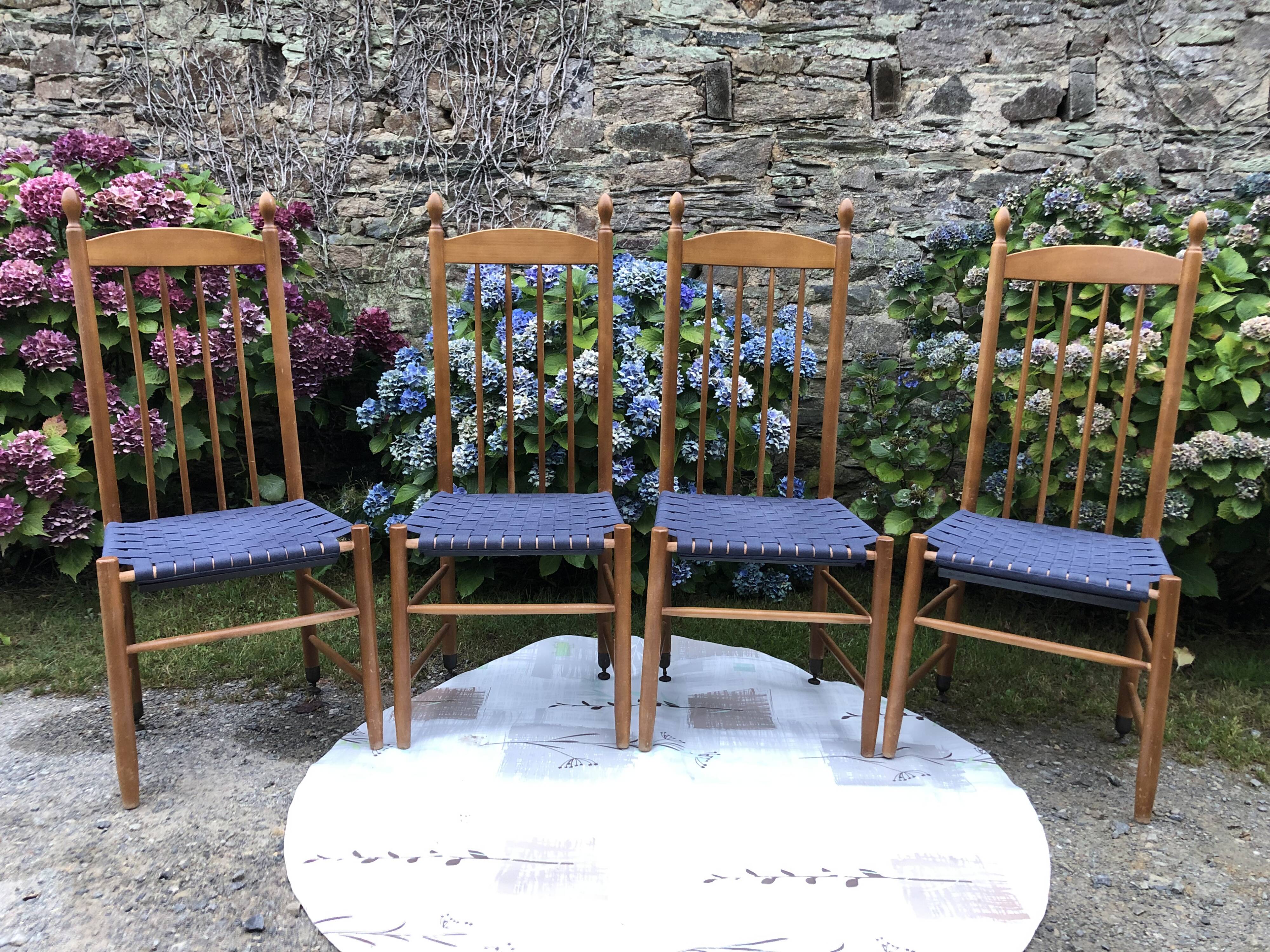 4 vintage Roche Bobois chairs from the 80s in beech with woven seats in blue fabric.