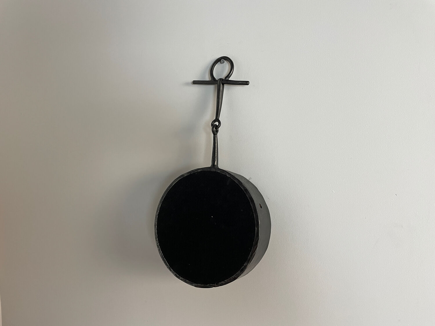 Brutalist iron mirror