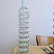Pair of vintage ribbed blown glass bottles with cork stoppers.