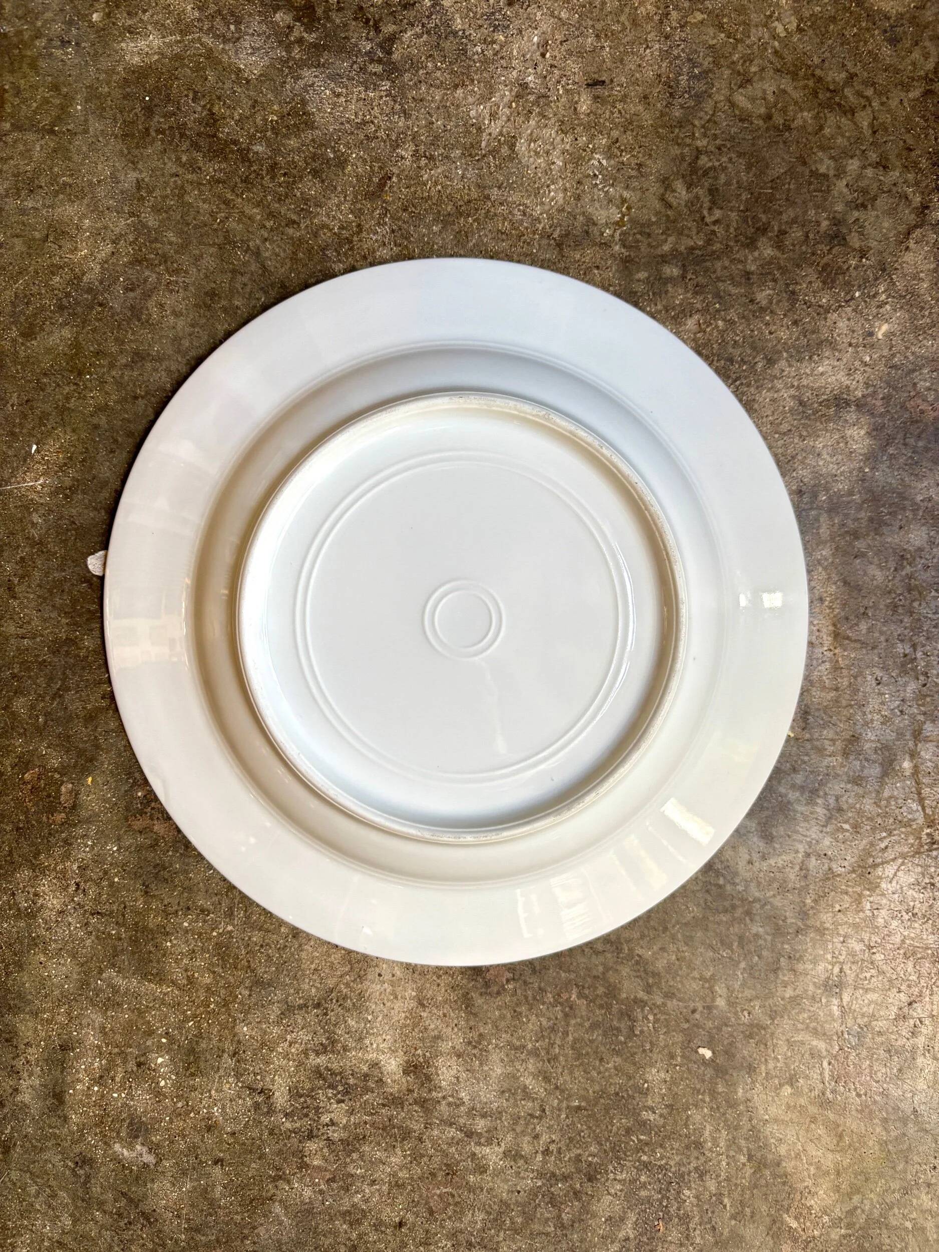 Gold monogrammed porcelain deep plate "F"