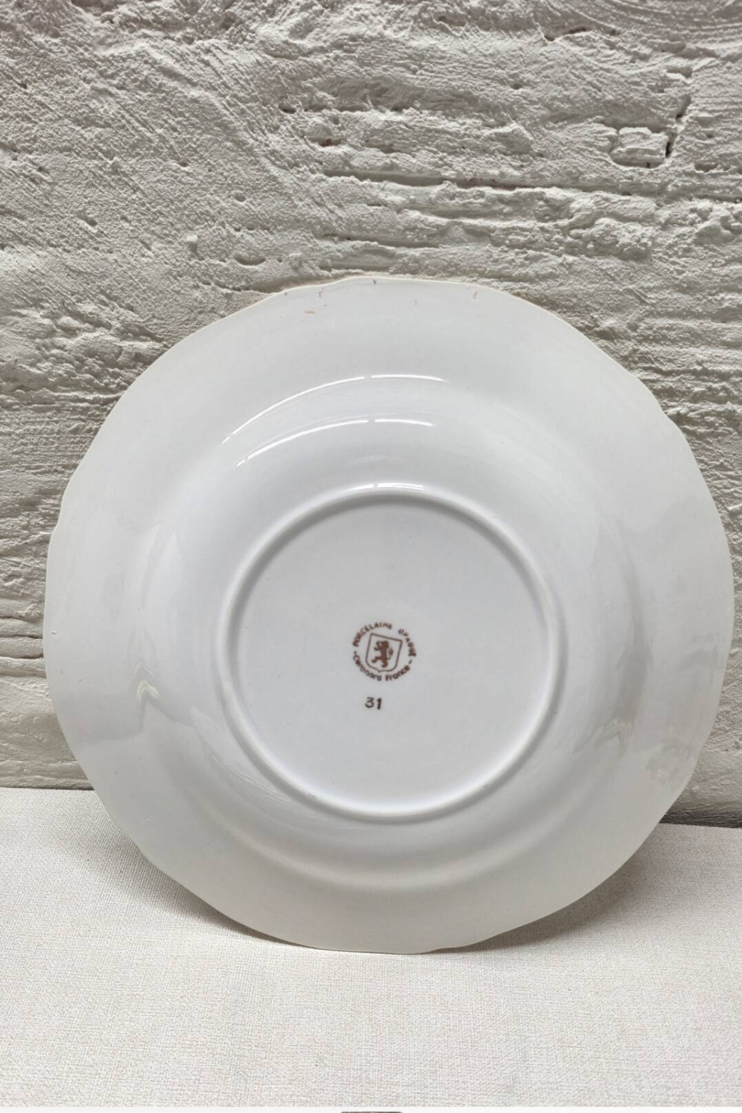 Set of 5 small flowered deep plates.