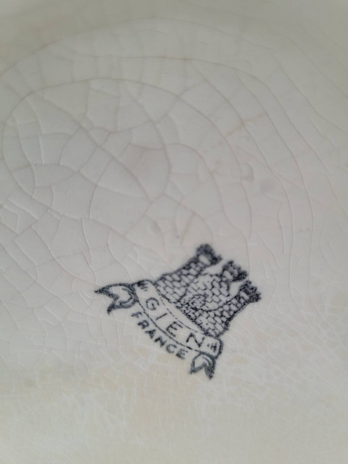 Pair of antique Gien porcelain pitchers