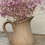 Small ancient sandstone pitcher